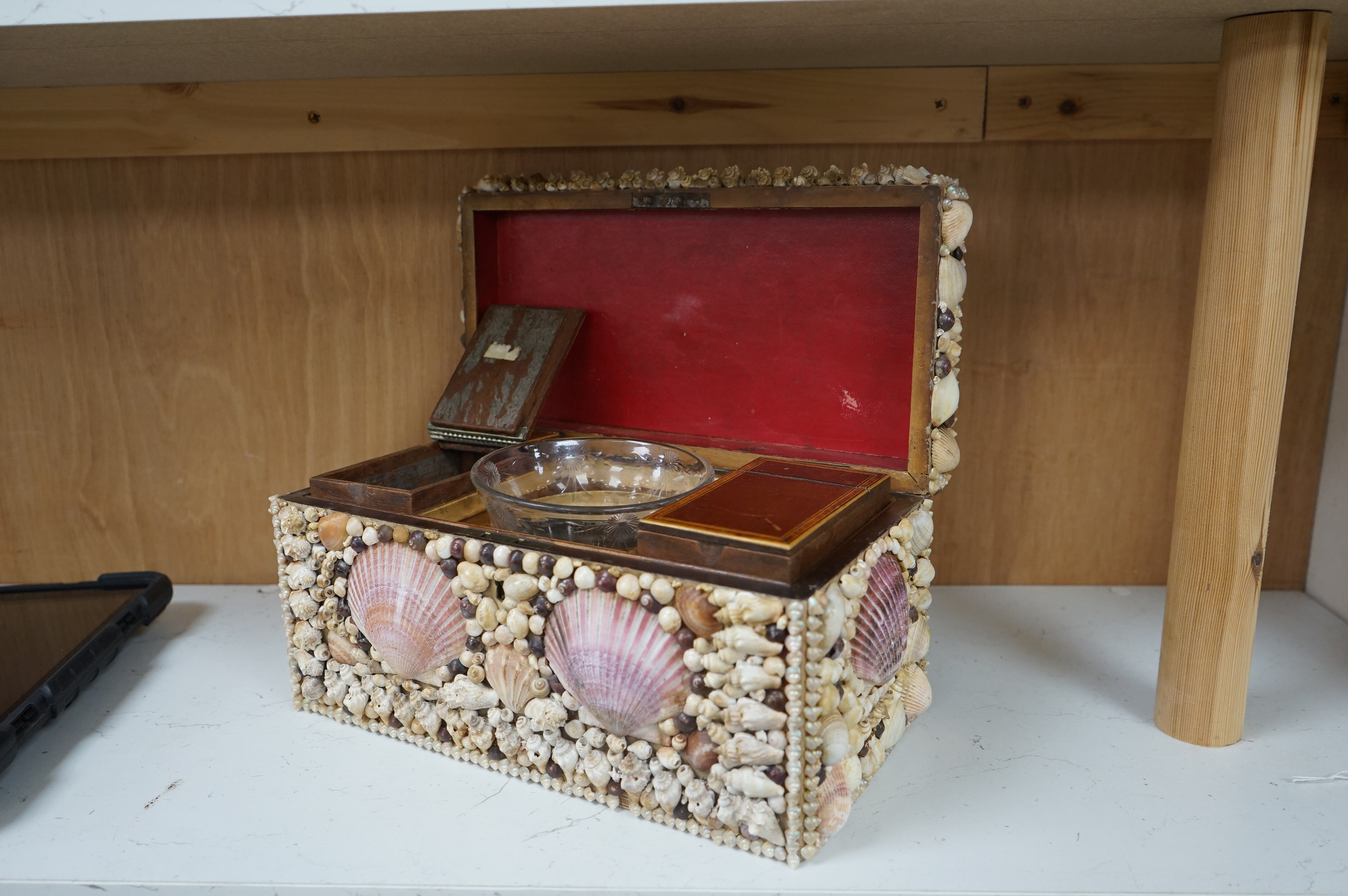 A George III tea caddy, shell covered in 19th century. 32cm wide x 15cm high x 17cm deep. Condition - a few shells missing but appears in good condition